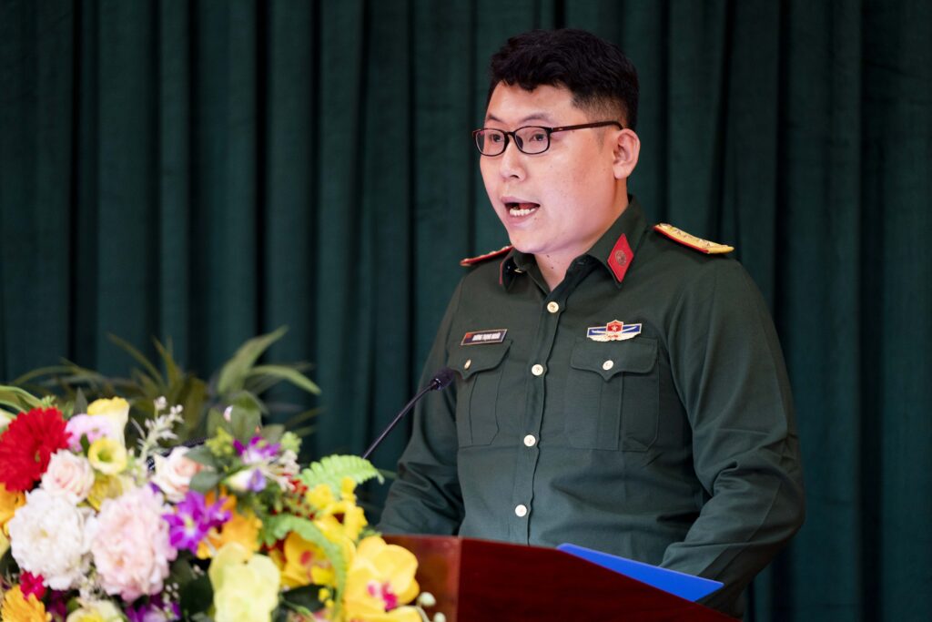 A Vietnamese military officer giving a speech at a podium.